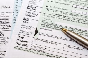 Sorting out taxes and reporting for a deceased employee